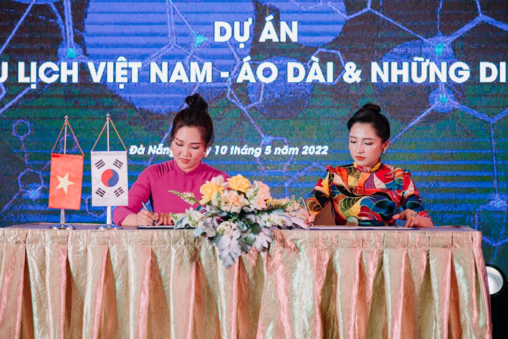 le gioi thieu su kien xac lap ky luc guinness viet nam nam nu doanh nhan mac trang phuc ao dai quang ba du lich nhieu nhat viet nam